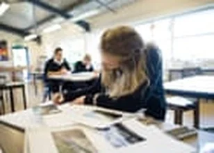 Teacher speaking to students