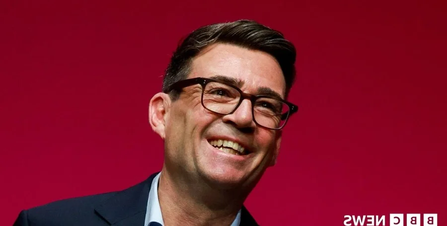 Andy Burnham speaking podium